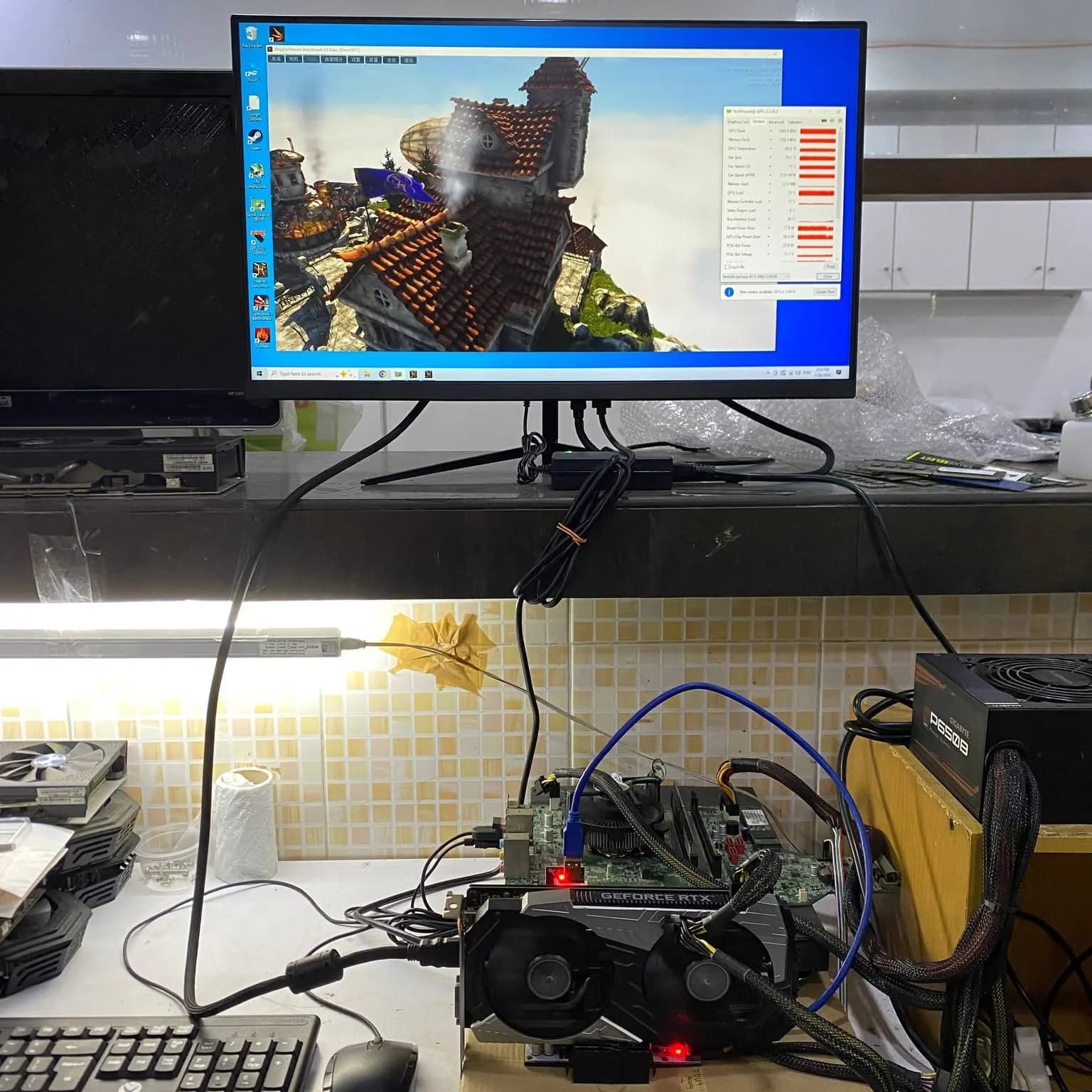 Monitor showing artifacts from a faulty graphic card during testing