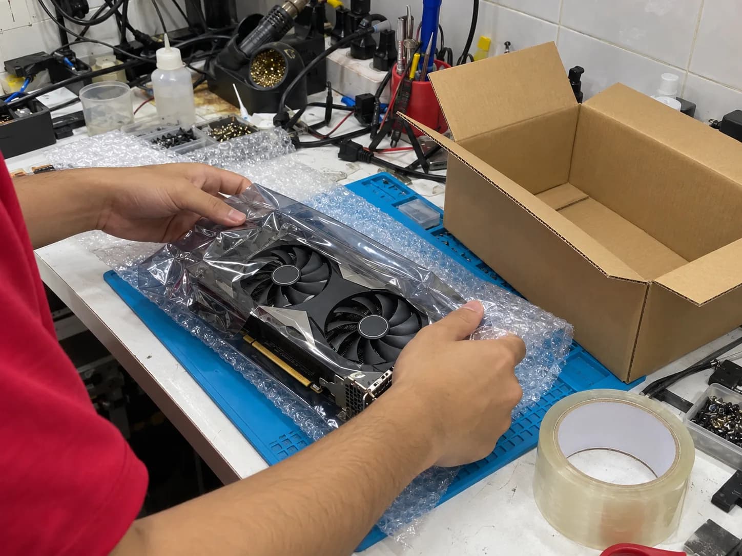 Graphic card packed in an anti-static bag and bubble wrap for mail-in repair